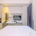 Homey&Warm Studio Apartment Oasis Cikarang By Travelio
