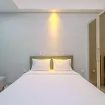 Homey&Warm Studio Apartment Oasis Cikarang By Travelio