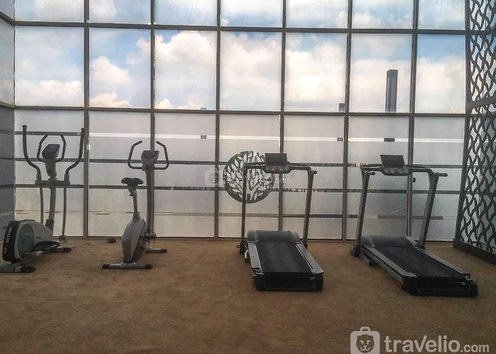 Homey&Warm Studio Apartment Oasis Cikarang By Travelio